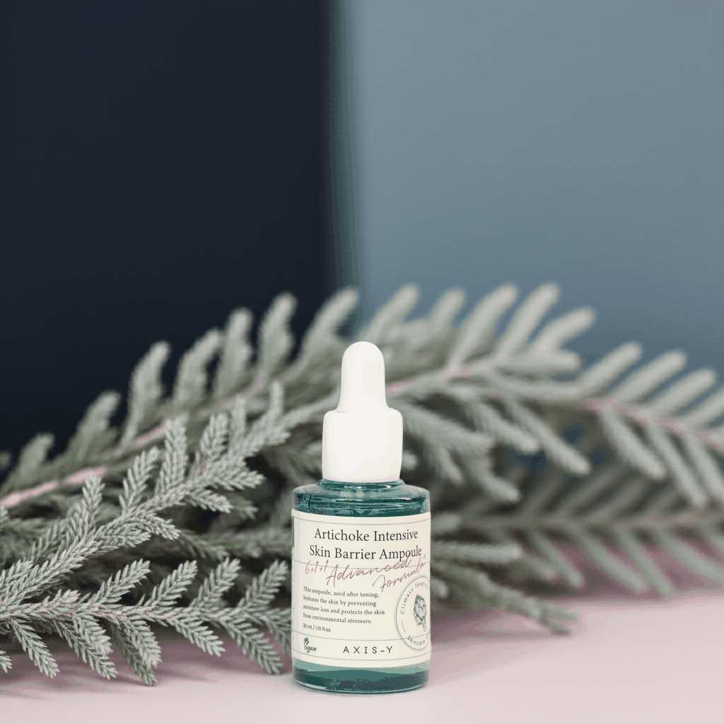 Siero AXIS-Y in flacone di vetro verde con contagocce bianco e etichetta beige, formulato con carciofo.