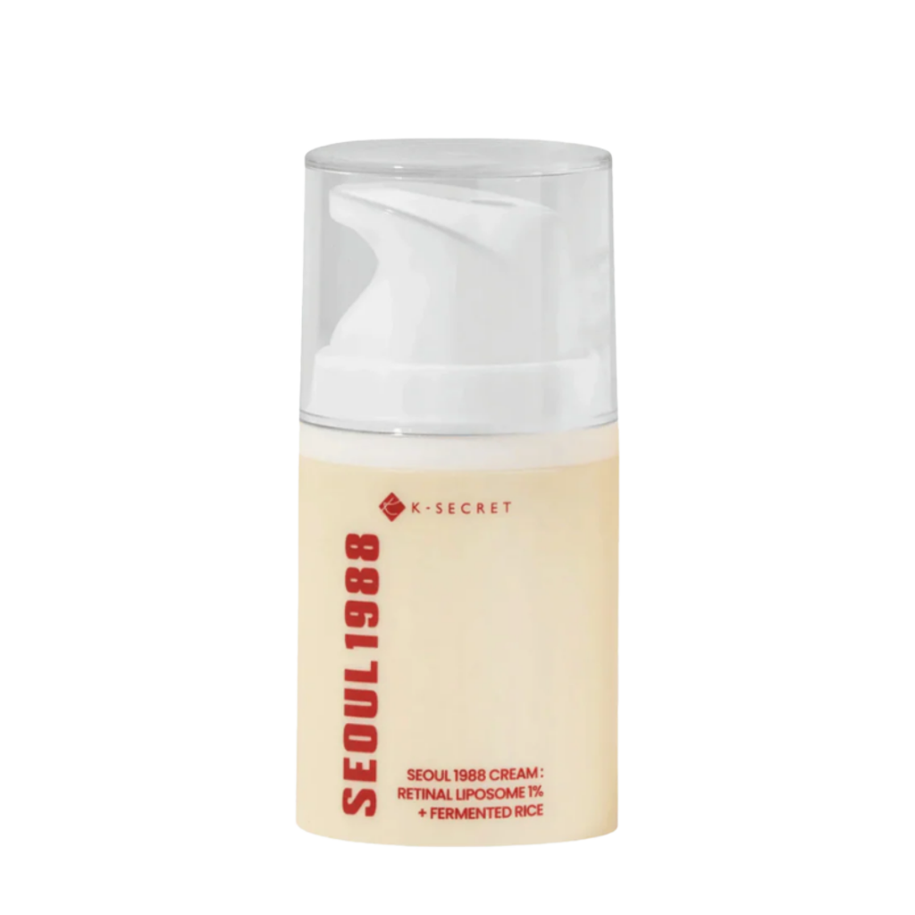 Crema viso DI NUOVO in flacone beige con tappo trasparente e scritte rosse, con erogatore a pompa