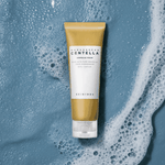 Detergente viso Ampoule Foam 125ml in tubetto dorato e bianco, con tappo trasparente e scritta Centella.