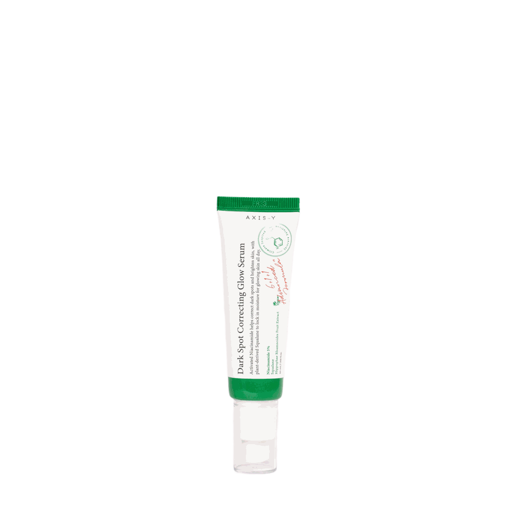 Siero viso Dark spot correcting in tubetto bianco con dettagli verdi e tappo trasparente, dal formato compatto