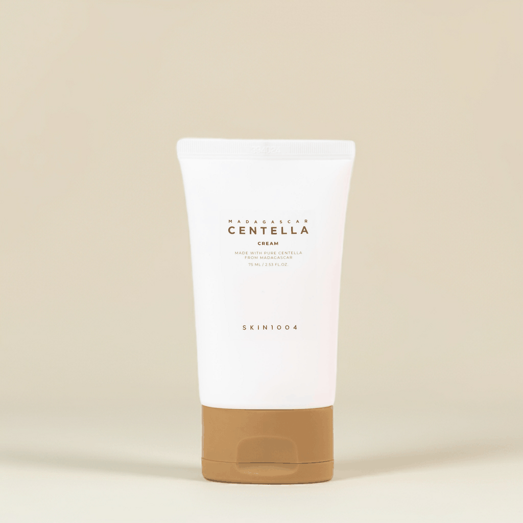 Crema viso Madagascar centella cream in tubo bianco con tappo color beige e scritte marroni SKIN1004